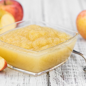 Close-up of a bowl full of applesauce