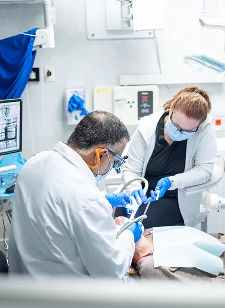 Dentist and patient reviewing dental insurance plan