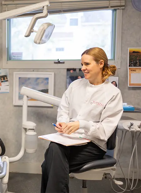 Dental patient calculating cost of dental treatment