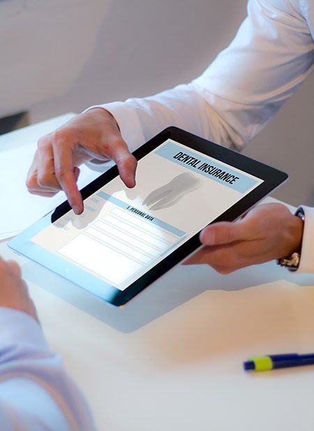 Dental insurance forms on tablet computer