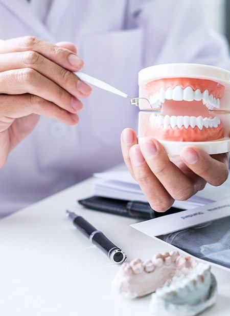 Dentist and patient reviewing dental insurance plan