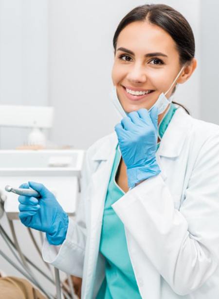 female dentist smiling at the camera 
