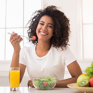 woman eating a salad 