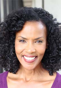 Woman holding an Invisalign tray