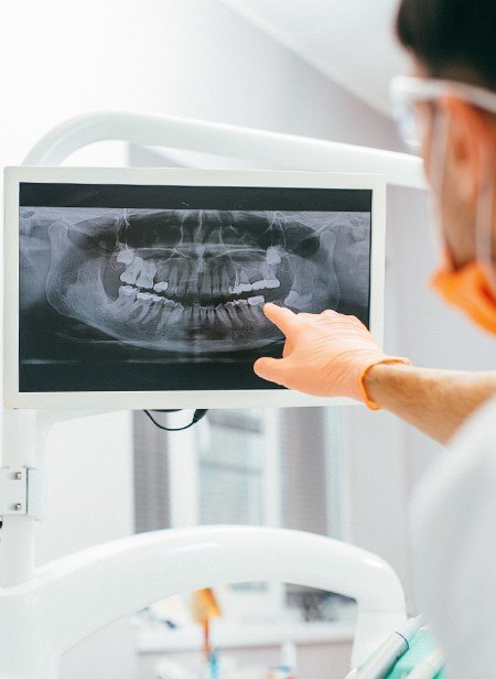 Patient looking at digital x-rays on tablet computer