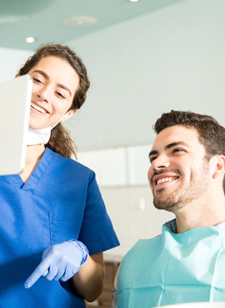 Cosmetic dentist in Manchester showing patient X rays