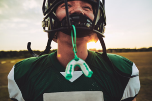 a young athlete with a mouthguard