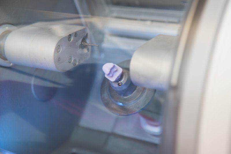 a dental crown in a milling unit
